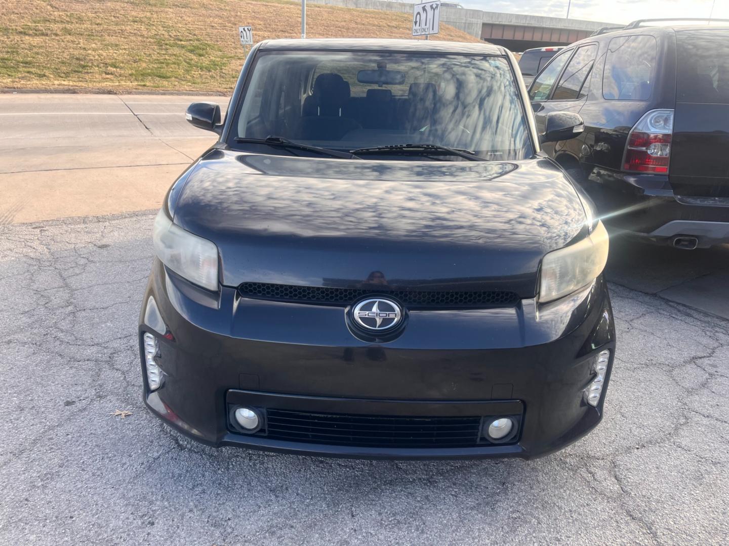 2015 BLACK SCION XB BASE 5-Door Wagon 5-Spd MT (JTLZE4FEXFJ) with an 2.4L L4 DOHC 16V engine, 5-Speed Manual transmission, located at 8101 E. Skelly Dr., Tulsa, OK, 74129, (918) 592-3593, 36.121891, -95.888802 - Photo#2